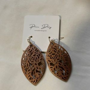 Rose gold earrings in the shape of a leaf